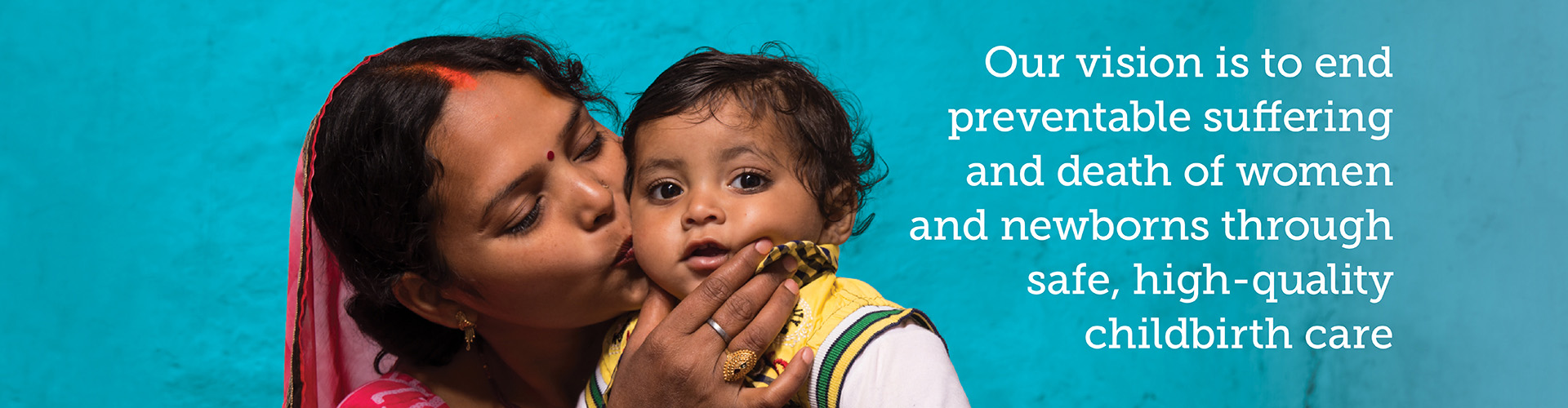 BetterBirth: A mother kissing her son's cheek